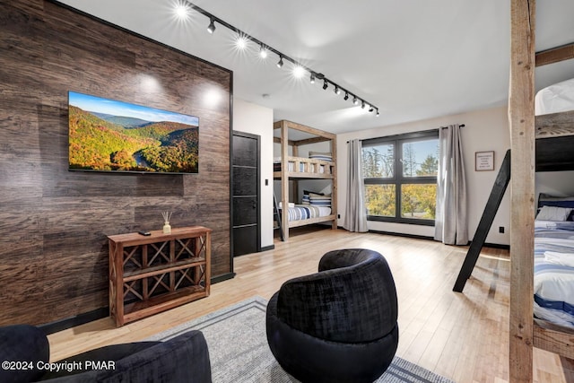 bedroom with wood finished floors