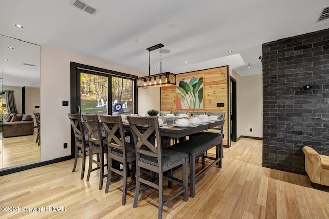 dining space featuring recessed lighting, visible vents, and light wood-style floors