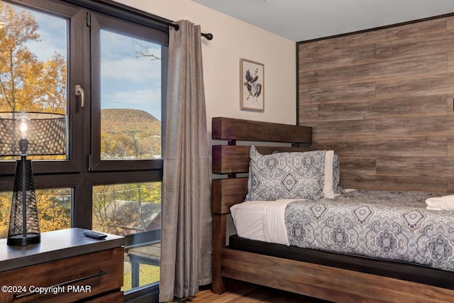 bedroom featuring multiple windows