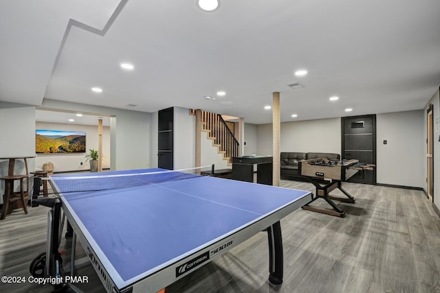 playroom with recessed lighting, baseboards, and wood finished floors