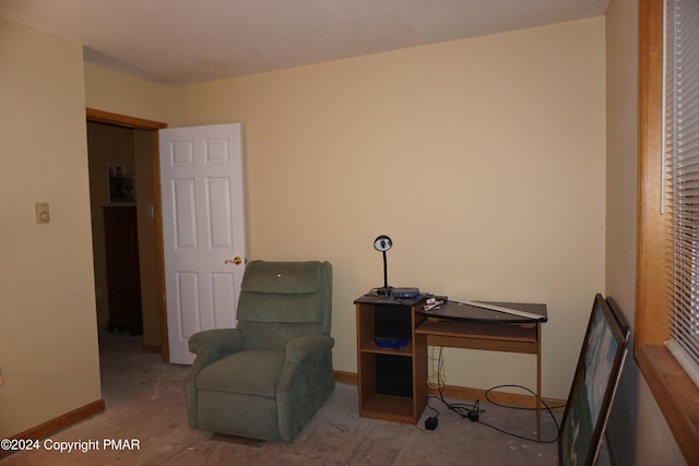 living area with baseboards