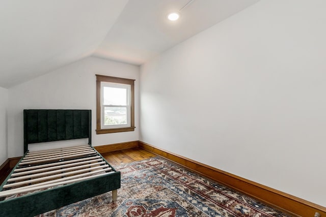 312 Columbia Ave, Palmerton, PA 18071 - bedroom with lofted ceiling and hardwood / wood-style floors