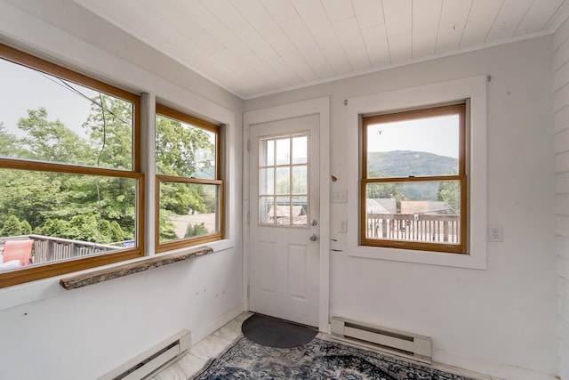312 Columbia Ave, Palmerton, PA 18071 - doorway with a baseboard heating unit, ornamental molding, and wooden ceiling