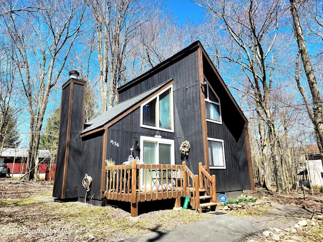 488 Country Place Dr, Tobyhanna, PA 18466 - back of house featuring a chimney and a deck