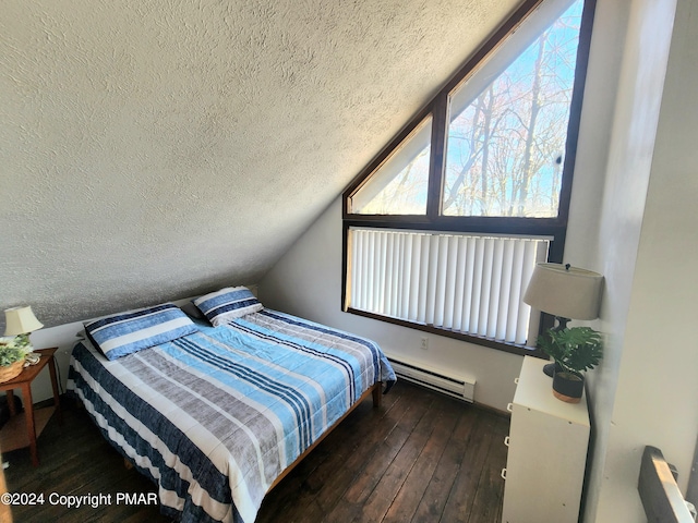 488 Country Place Dr, Tobyhanna, PA 18466 - bedroom featuring a baseboard heating unit, lofted ceiling, a textured ceiling, and hardwood / wood-style flooring