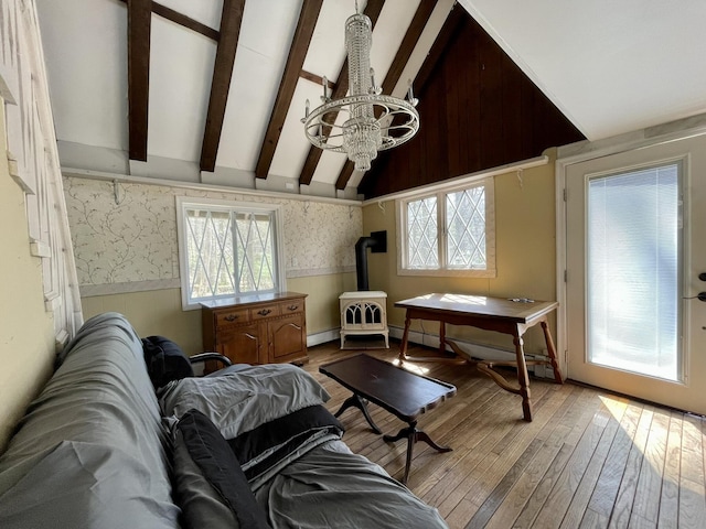 215 Outer Dr, Dingmans Ferry, PA 18328 - living room with light wood finished floors, wallpapered walls, a wainscoted wall, and a healthy amount of sunlight