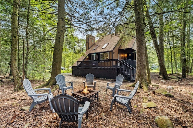 483 Alter Ave, Pocono Summit, PA 18346 - view of yard featuring an outdoor fire pit, a deck, and stairway