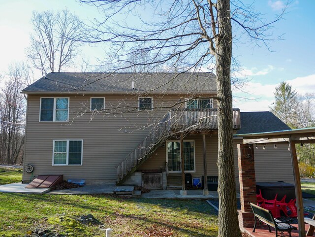 5109 Hickory Ln, East Stroudsburg, PA 18302 - rear view of house with a wooden deck, a patio, and stairs