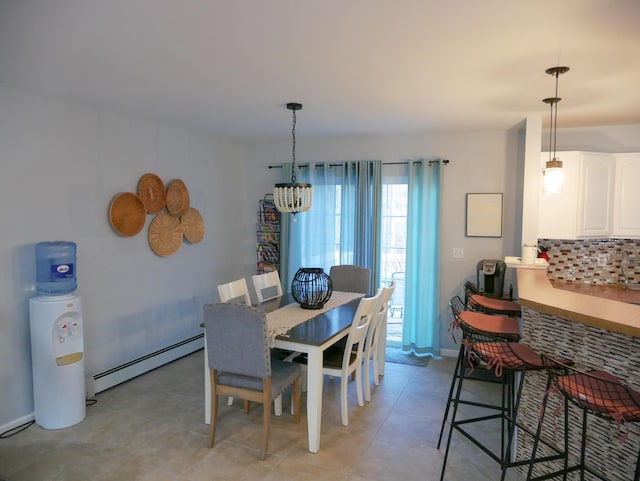 5109 Hickory Ln, East Stroudsburg, PA 18302 - dining space featuring a chandelier, baseboards, baseboard heating, and light tile patterned floors