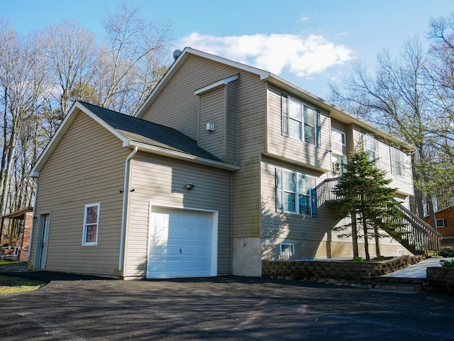 5109 Hickory Ln, East Stroudsburg, PA 18302 - view of side of property with aphalt driveway and stairs