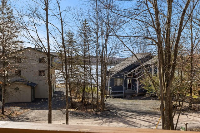 225 N Arrow Dr, Pocono Lake, PA 18347 - rustic home with a sunroom
