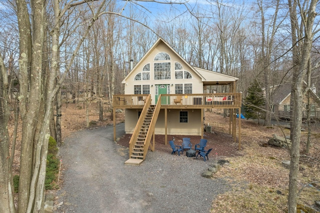 225 N Arrow Dr, Pocono Lake, PA 18347 - view of front facade with stairs and a deck