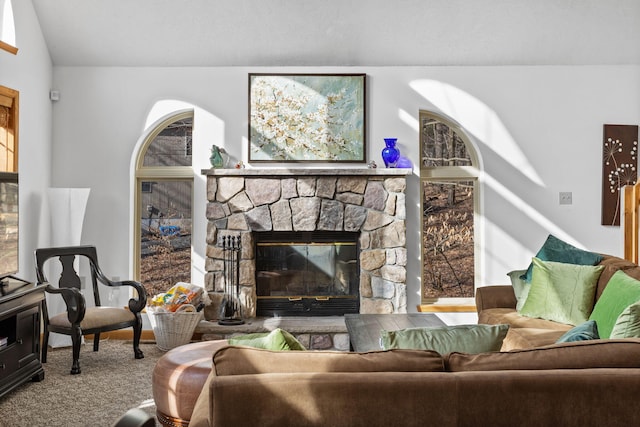 225 N Arrow Dr, Pocono Lake, PA 18347 - living area with a fireplace, vaulted ceiling, and carpet