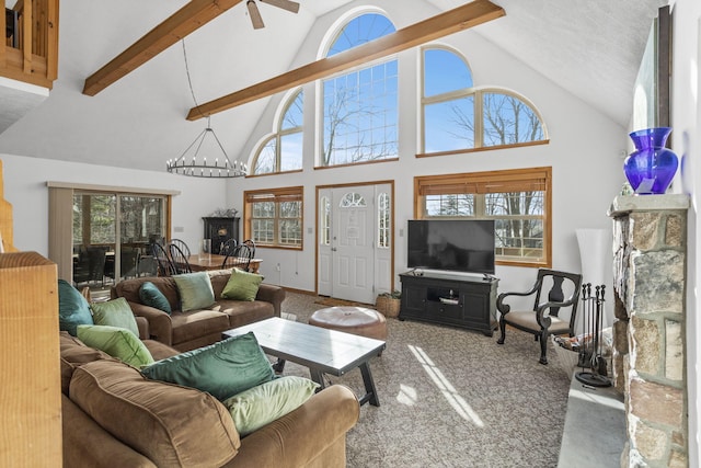 225 N Arrow Dr, Pocono Lake, PA 18347 - living room with carpet floors, high vaulted ceiling, a chandelier, beamed ceiling, and a ceiling fan