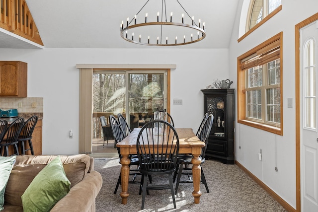 225 N Arrow Dr, Pocono Lake, PA 18347 - dining space featuring a chandelier, vaulted ceiling, and carpet