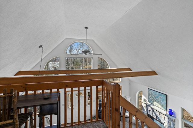 225 N Arrow Dr, Pocono Lake, PA 18347 - stairs with ceiling fan, vaulted ceiling, and a textured ceiling