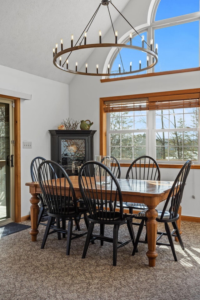 225 N Arrow Dr, Pocono Lake, PA 18347 - carpeted dining area featuring lofted ceiling and a chandelier