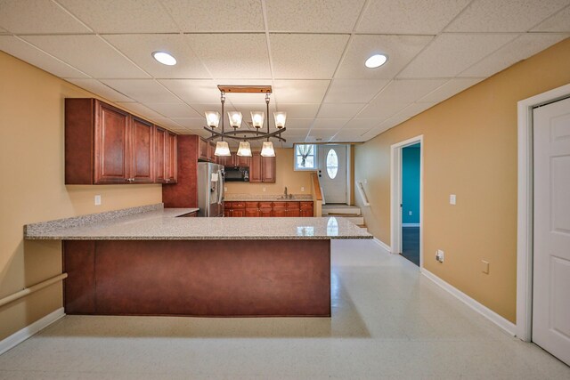 205 Osprey Way E, Stroudsburg, PA 18302 - kitchen with stainless steel refrigerator with ice dispenser, light countertops, baseboards, and recessed lighting