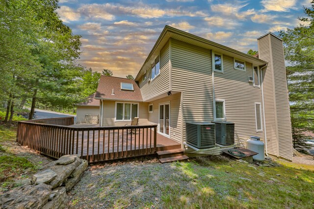 205 Osprey Way E, Stroudsburg, PA 18302 - back of property with a chimney, central AC, and a deck