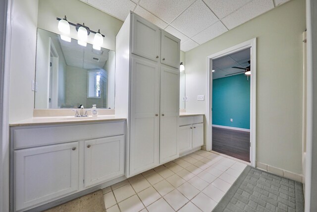205 Osprey Way E, Stroudsburg, PA 18302 - bathroom with vanity, a paneled ceiling, tile patterned flooring, and ceiling fan