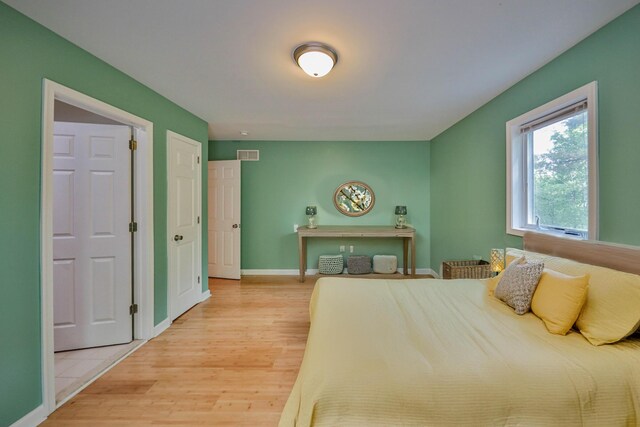 205 Osprey Way E, Stroudsburg, PA 18302 - bedroom with light wood-style flooring and baseboards