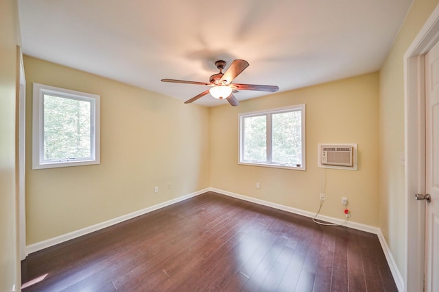 205 Osprey Way E, Stroudsburg, PA 18302 - unfurnished room with a wall mounted AC, dark wood-type flooring, a ceiling fan, and baseboards
