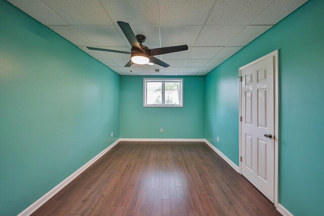 205 Osprey Way E, Stroudsburg, PA 18302 - unfurnished bedroom with a paneled ceiling, dark wood-style flooring, baseboards, and ceiling fan