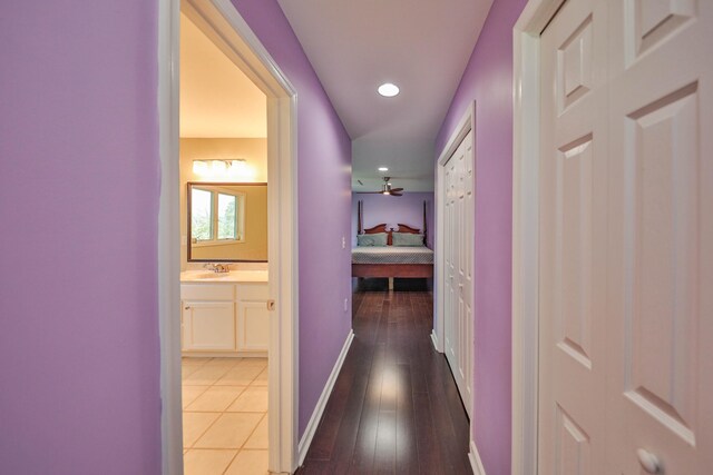 205 Osprey Way E, Stroudsburg, PA 18302 - corridor featuring a sink, baseboards, recessed lighting, and light wood finished floors