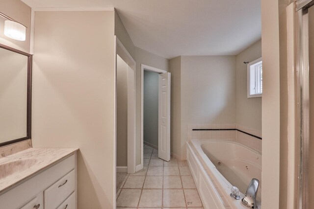 205 Osprey Way E, Stroudsburg, PA 18302 - full bathroom featuring vanity, a jetted tub, tile patterned flooring, and baseboards