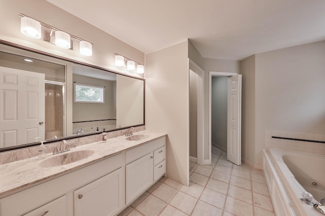 205 Osprey Way E, Stroudsburg, PA 18302 - bathroom featuring double vanity, a jetted tub, tile patterned flooring, a shower with shower door, and baseboards