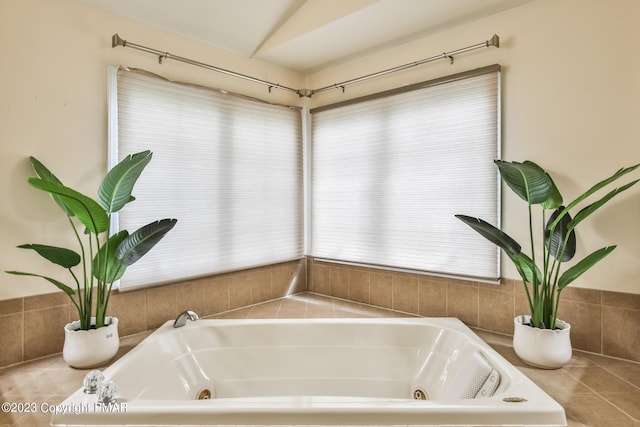 full bath with a jetted tub