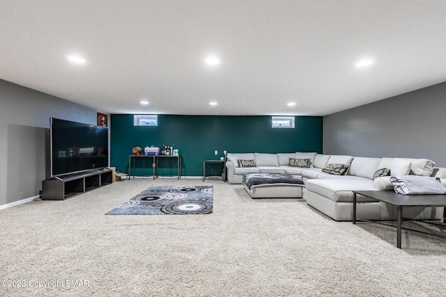 carpeted living room with baseboards and recessed lighting