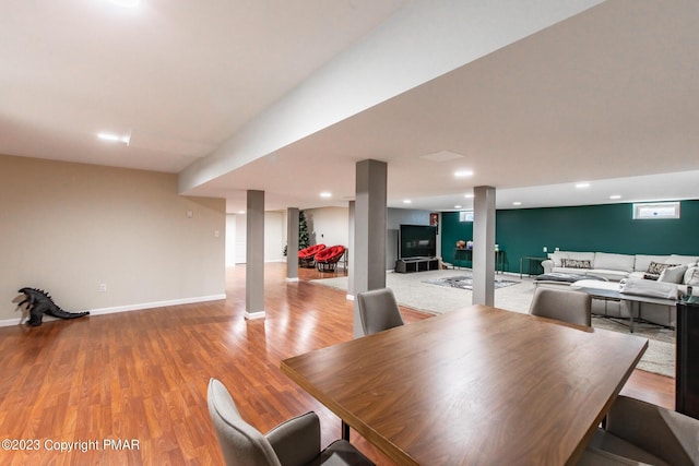 dining room featuring recessed lighting, baseboards, and wood finished floors