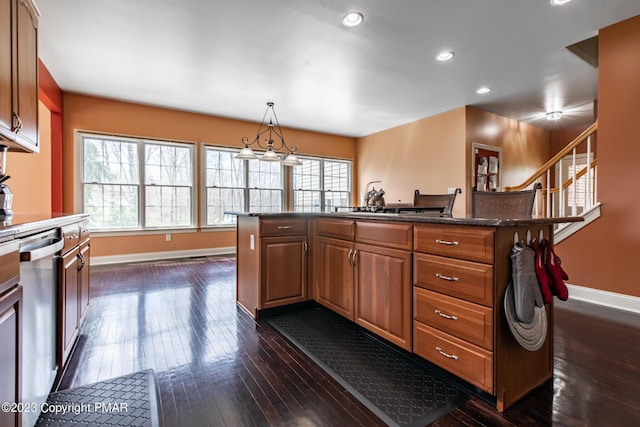 kitchen with recessed lighting, dark wood-style floors, baseboards, brown cabinets, and dishwasher