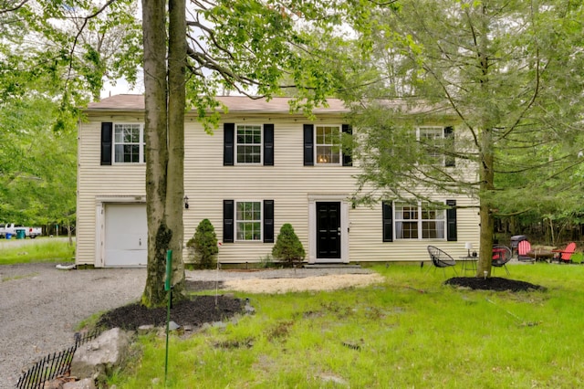 1490 Waterfront Dr, Tobyhanna, PA 18466 - colonial inspired home with an attached garage, driveway, and a front yard