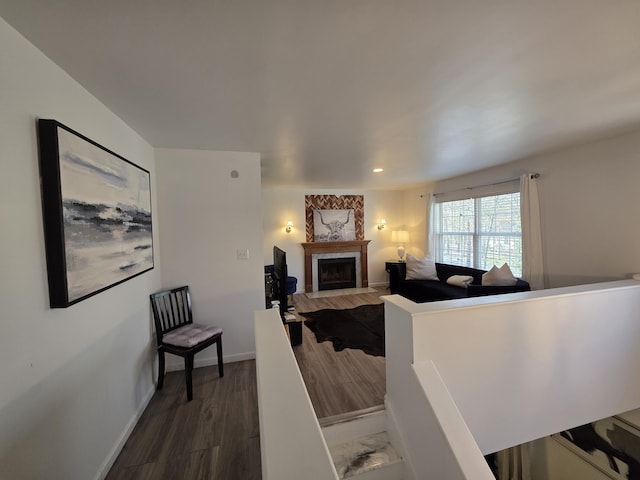 1490 Waterfront Dr, Tobyhanna, PA 18466 - living area with a fireplace with flush hearth, dark wood-style flooring, recessed lighting, and baseboards