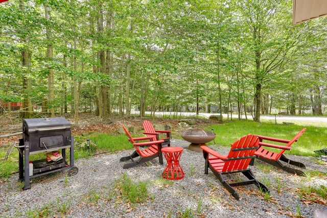1490 Waterfront Dr, Tobyhanna, PA 18466 - view of yard featuring a fire pit