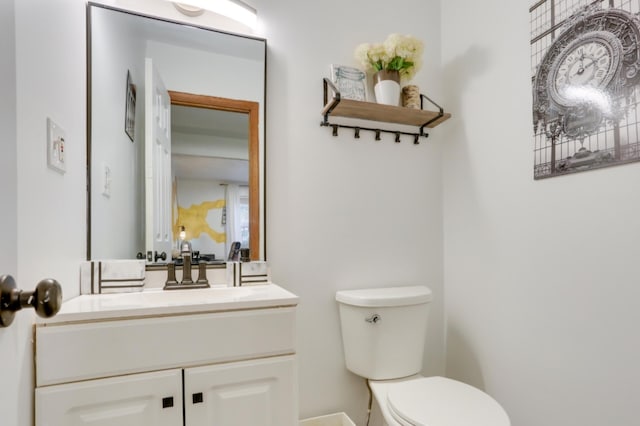 1490 Waterfront Dr, Tobyhanna, PA 18466 - half bath with toilet, vanity, and baseboards