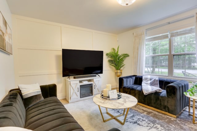 1490 Waterfront Dr, Tobyhanna, PA 18466 - living area featuring a fireplace and light wood-type flooring