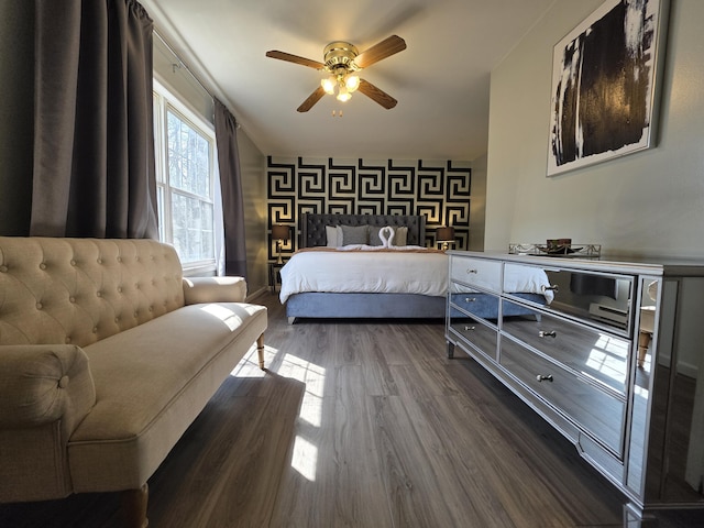 1490 Waterfront Dr, Tobyhanna, PA 18466 - bedroom featuring an accent wall, dark wood-style floors, wallpapered walls, ceiling fan, and baseboards