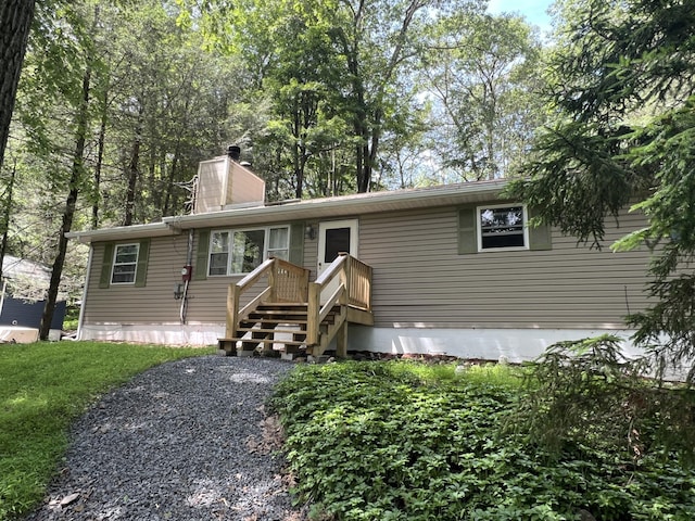1553 Locust Ln, Pocono Lake, PA 18347 - manufactured / mobile home featuring a chimney