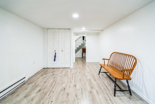 1553 Locust Ln, Pocono Lake, PA 18347 - sitting room with a baseboard heating unit, stairway, light wood finished floors, and recessed lighting