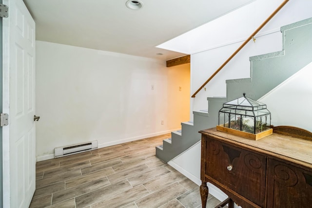 1553 Locust Ln, Pocono Lake, PA 18347 - stairs featuring a baseboard heating unit and wood finished floors