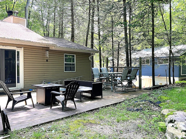 1553 Locust Ln, Pocono Lake, PA 18347 - view of patio featuring a deck, outdoor dining space, and a fire pit