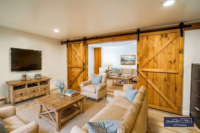 1553 Locust Ln, Pocono Lake, PA 18347 - living area featuring a barn door, light wood-style floors, and recessed lighting