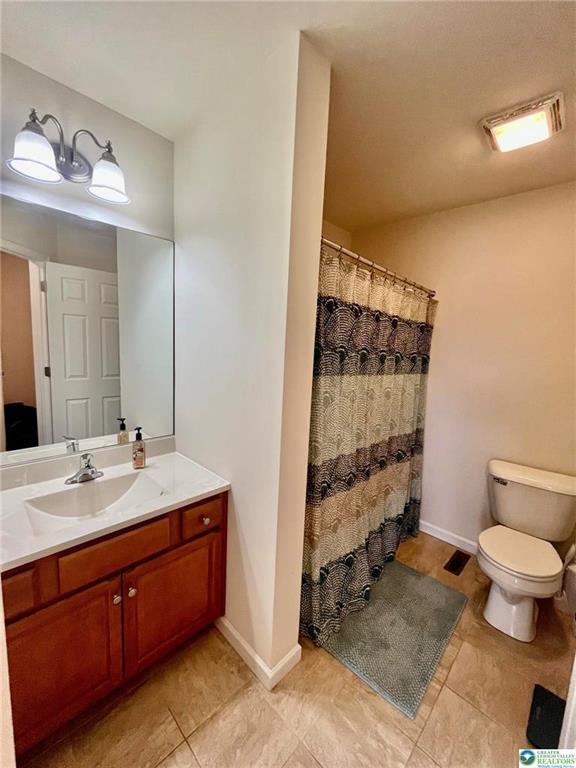 630 Lehigh Gap St, Walnutport, PA 18088 - bathroom with vanity and tile patterned floors