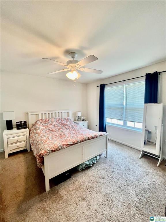 630 Lehigh Gap St, Walnutport, PA 18088 - carpeted bedroom featuring a ceiling fan and baseboards
