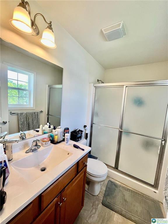 630 Lehigh Gap St, Walnutport, PA 18088 - full bathroom featuring vanity and a shower stall