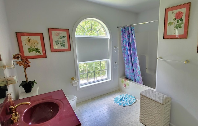 6251 Decker Rd, Bushkill, PA 18324 - full bathroom featuring tile patterned floors, shower / bath combo, and vanity
