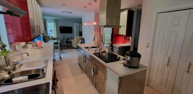 6251 Decker Rd, Bushkill, PA 18324 - kitchen featuring black electric cooktop, light countertops, open floor plan, ventilation hood, and pendant lighting